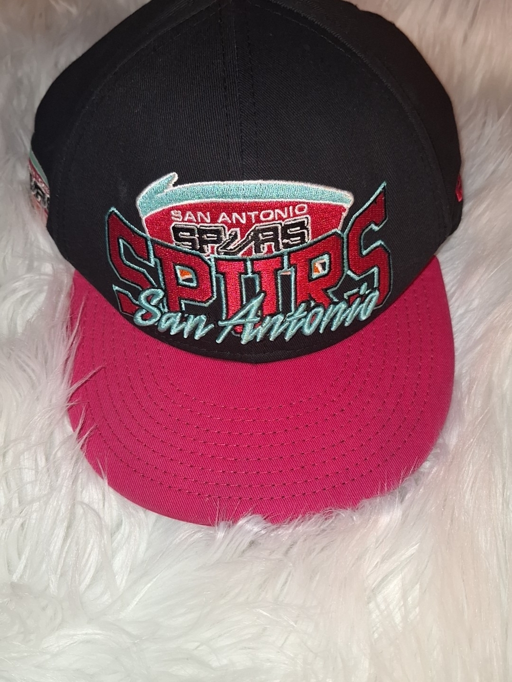 New Era San Antonio Spurs Black and Pink Kids Snapback Hat.